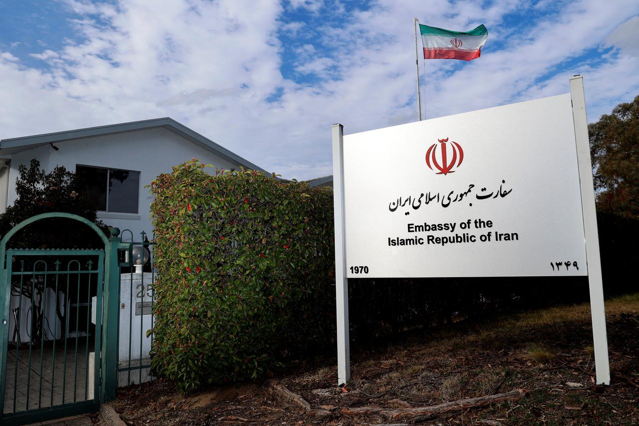 The Iranian national flag flies over the Iranian embassy in Canberra on August 26, 2025. (AFP Photo)