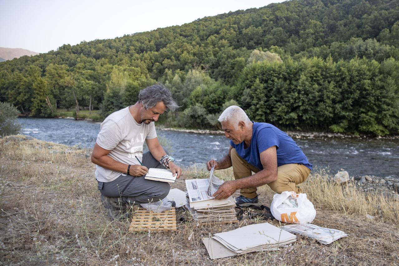 Konya-based academic Metin Armagan (left) during his field research in the rural areas of Tunceli, Türkiye, Aug. 25, 2025. (AA Photo)