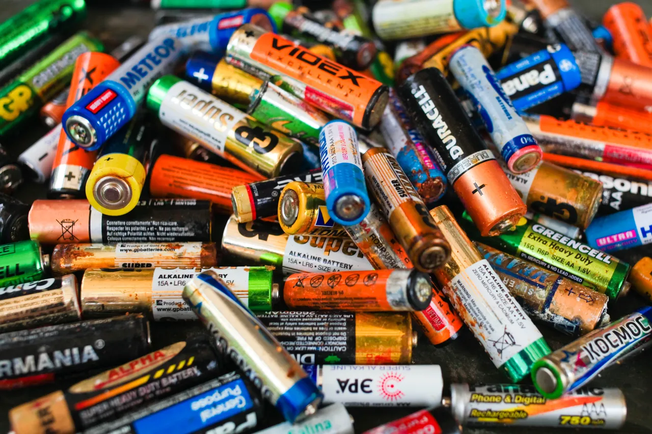 Old, used, and discarded AA cells and other electric batteries from different manufacturers in Krasnodar, Russia, on 8 June 2019.  (Adobe Stock Photo)