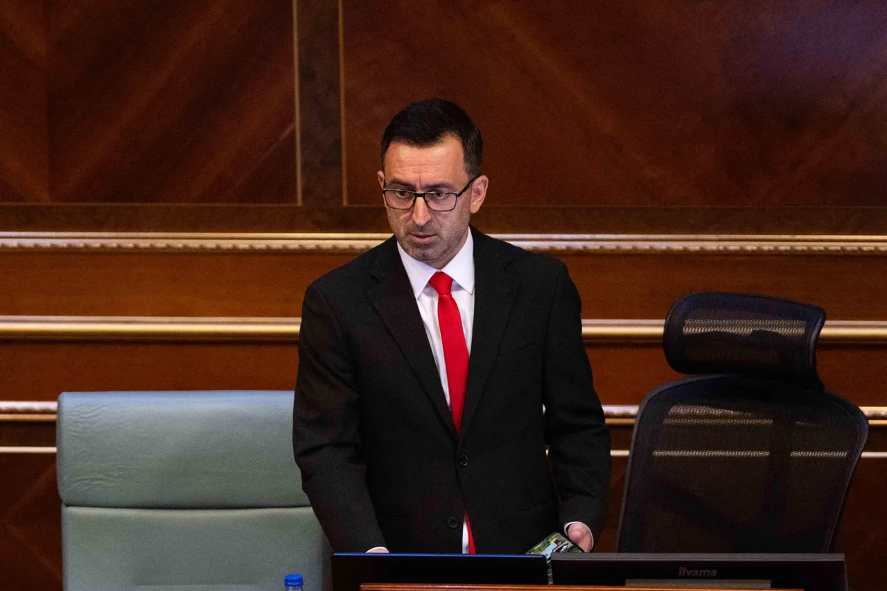 Dimal Basha, Kosovo’s newly elected parliamentary speaker, speaks to lawmakers during a session in Pristina, August 26, 2025. (AFP Photo)