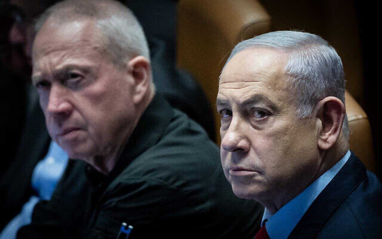 Prime Minister Benjamin Netanyahu, right, and then-Defense Minister Yoav Gallant attend a vote at the Knesset plenum in Jerusalem, March 13, 2024. (Courtesy of Flash90)
