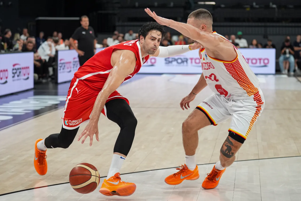 Furkan Korkmaz (L) of Turkiye competes against Igor Drobnjak (R) of Montenegro during friendly basketball match between Turkiye and Montenegro at Basketball Development Center in Istanbul, Türkiye on August 23, 2025. (AA Photo)