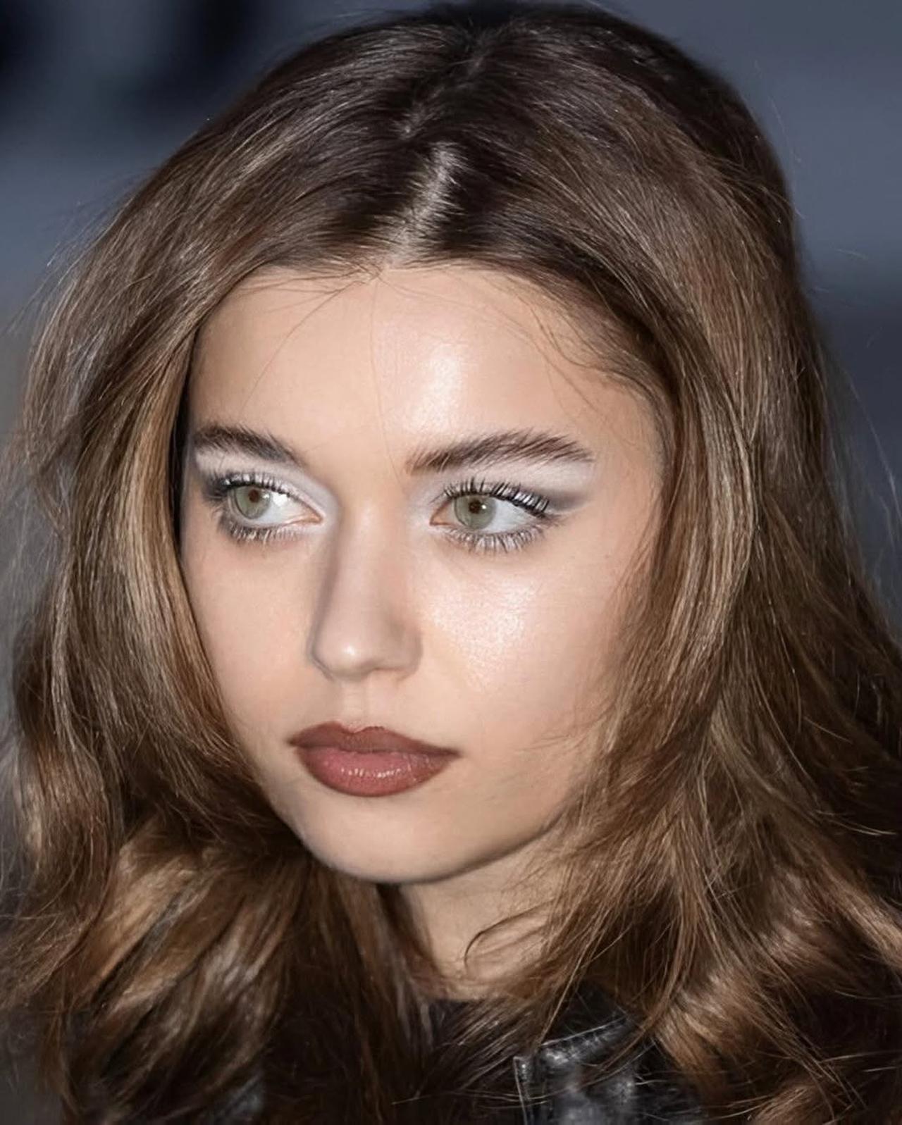 Turkish actress Afra Saracoglu shares a close-up portrait in her March 10, 2025 Instagram post, highlighting her natural beauty with soft waves and bold eye makeup. (Photo via Instagram/@afrasaracoglu)