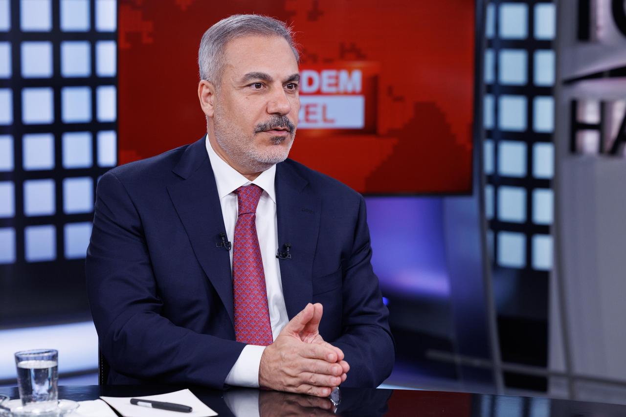 Foreign Minister Hakan Fidan attends a live broadcast in Ankara, Türkiye on August 28, 2025. (AA Photo)
