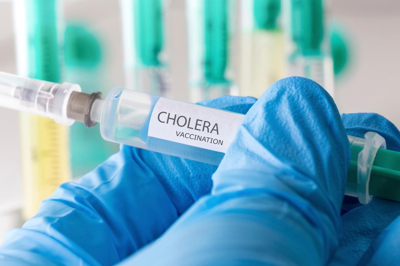 A healthcare worker’s needle filled and ready to deliver cholera vaccination. (Adobe Stock Photo)