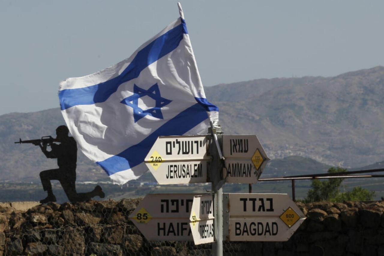 An Israeli flag is seen placed on Mount Bental in the Israeli-occupied Golan Heights on May 10, 2018. (AFP Photo)