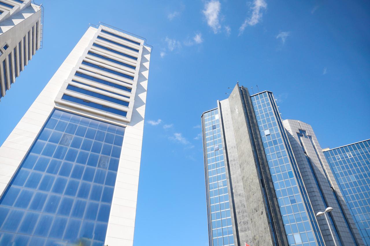 Low-angle view of financial towers in Istanbul, Türkiye. (Adobe Stock Photo)