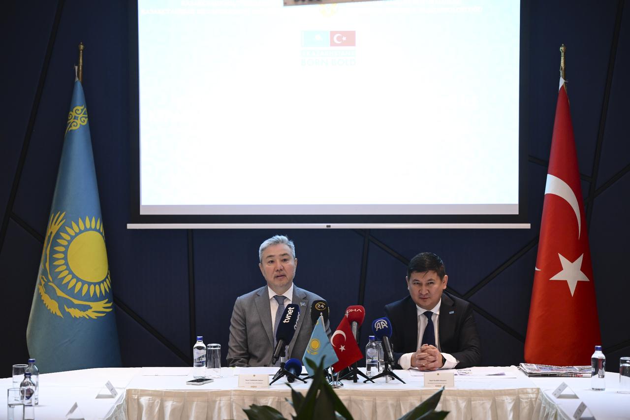 Kazakhstans Ambassador to Ankara Yerkebulan Sapiyev (left) and Istanbul Consul General Nuriddin Amankul (right) meet with media sector representatives in Istanbul, Türkiye on Aug. 29. 2025. (AA Photo)