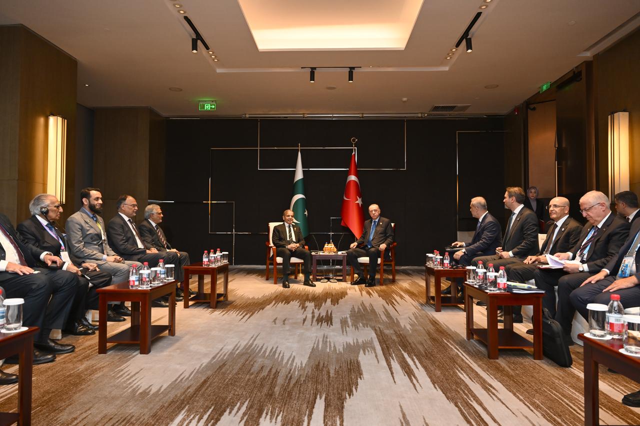 President Recep Tayyip Erdogan (C - R) meets with Pakistani Prime Minister Shahbaz Sharif (C - L) within the Shanghai Cooperation Organization summit in Tianjin, China on August 31, 2025. (AA Photo)