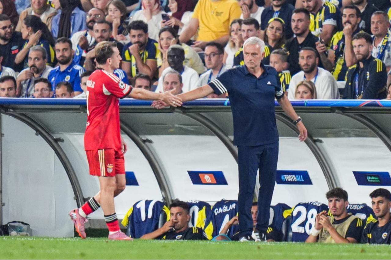 Head coach Jose Mourinho of Fenerbahce congratulates Kerem Akturkoglu of Benfica during the UEFA Champions League play-off round match between Fenerbahce and Benfica, at Chobani Stadium in Istanbul, Türkiye, August 20, 2025. (AA Photo)