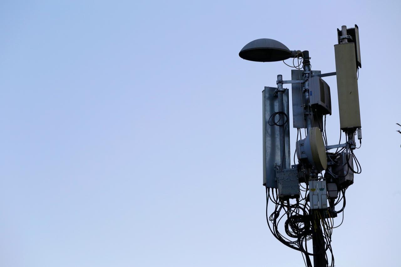 3G, 4G and 5G telecommunication antennas installed on a streetlight pole in Istanbul, Türkiye. (Adobe Stock Photo)