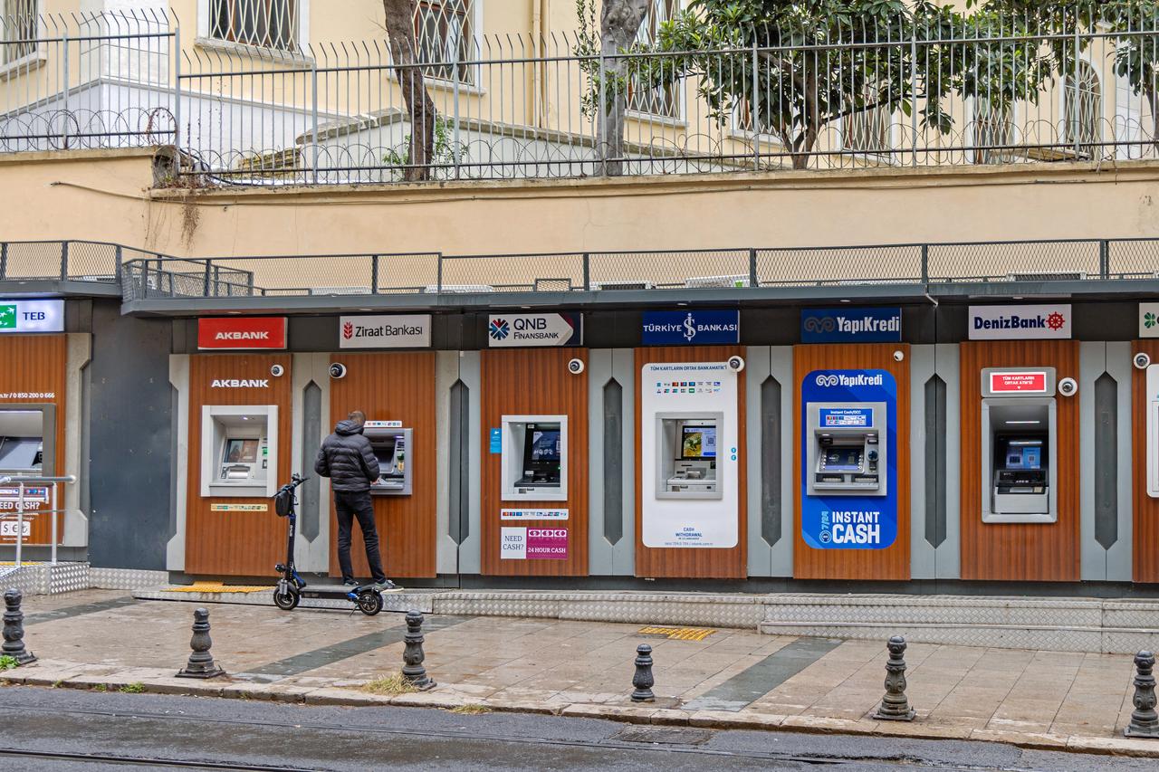 Multi bank ATM at street in city centre in Istanbul, Türkiye. (Adobe Stock Photo)
