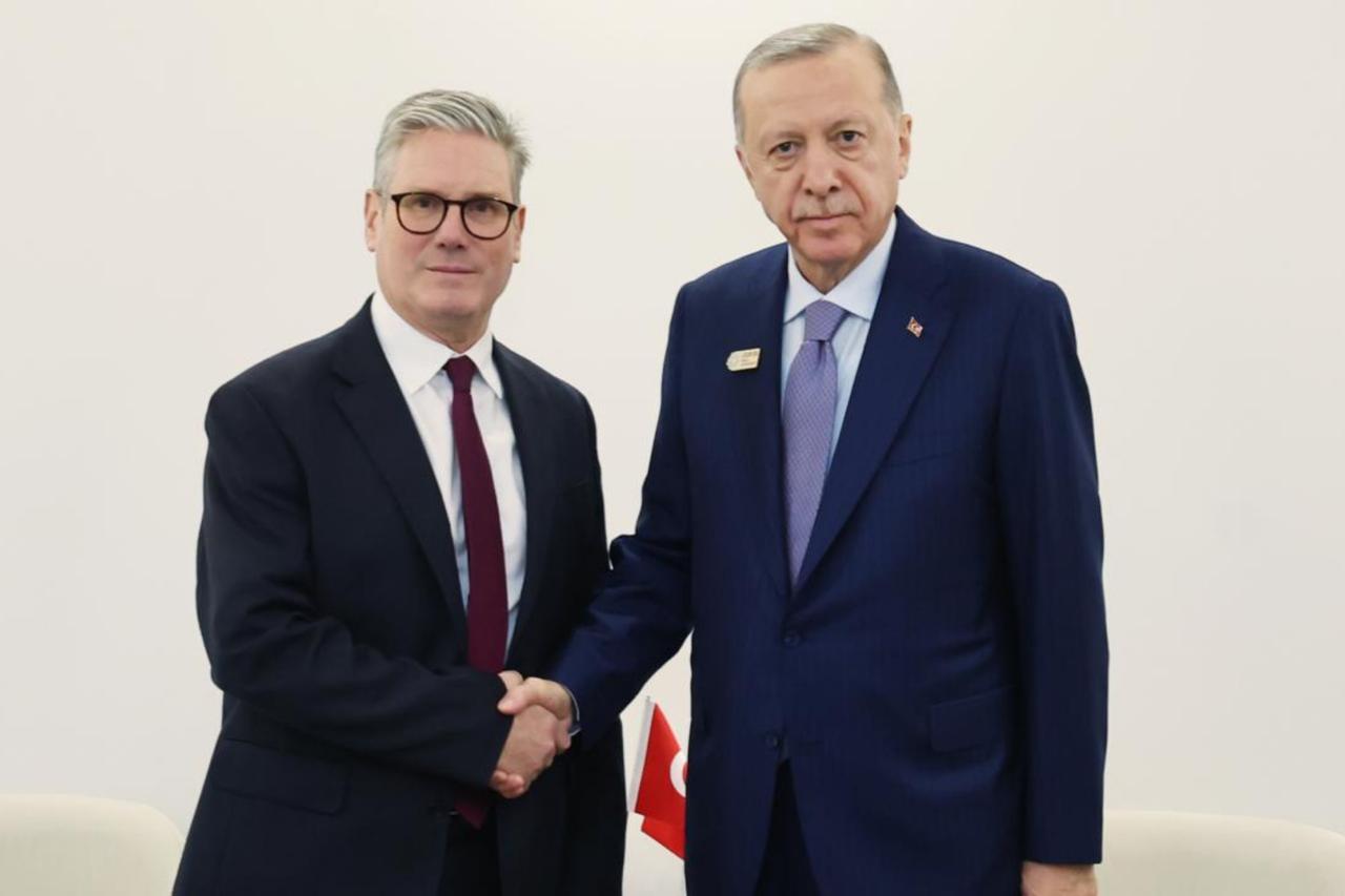 Turkish President Recep Tayyip Erdogan and British Prime Minister Keir Starmer pose for a photo following their meeting on the sidelines of the 2024 United Nations Climate Change Conference in Baku, Azerbaijan, November 12, 2024. (Photo via Iletisim.gov.tr)