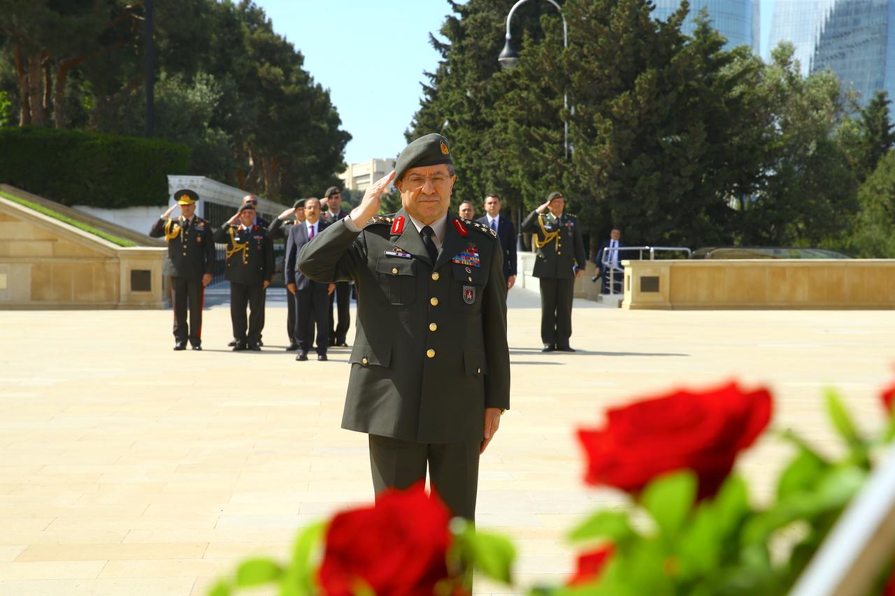 Then-Turkish Commander of the Land Forces, General Selcuk Bayraktaroglu visits the Baku Martyrs Alley during his visit to Baku, Azerbaijan on May 21, 2024. (AA Photo)