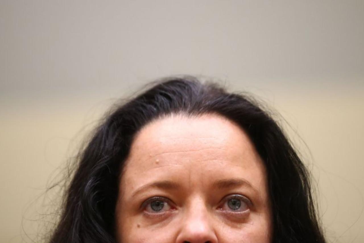 Beate Zschaepe from National Socialist Underground (NSU), arrives for the continuation of her trial at a courtroom in Munich, southern Germany, May 3, 2017. (AFP Photo)