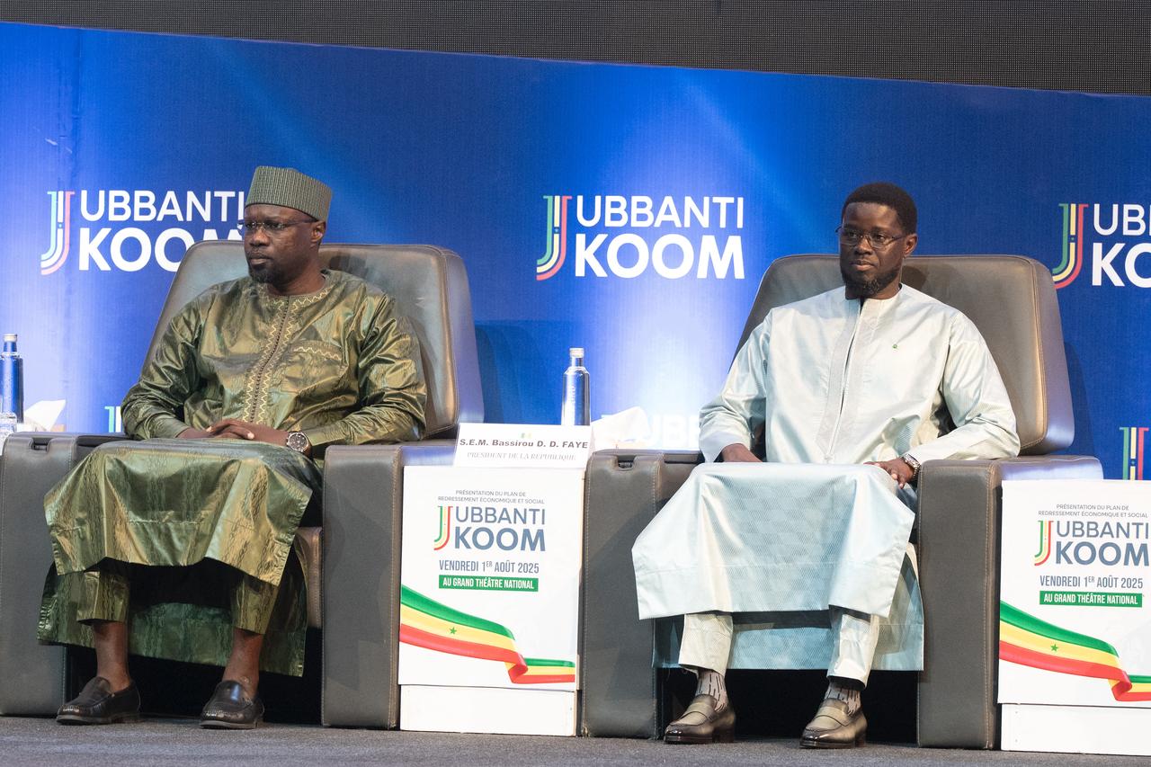 Senegalese PM Ousmane Sonko (L) and Senegalese President Bassirou Diomaye Faye (R) attend the opening of the official ceremony of the presentation of the economic and social recovery plan  in Dakar on August 1, 2025. (AFP Photo)