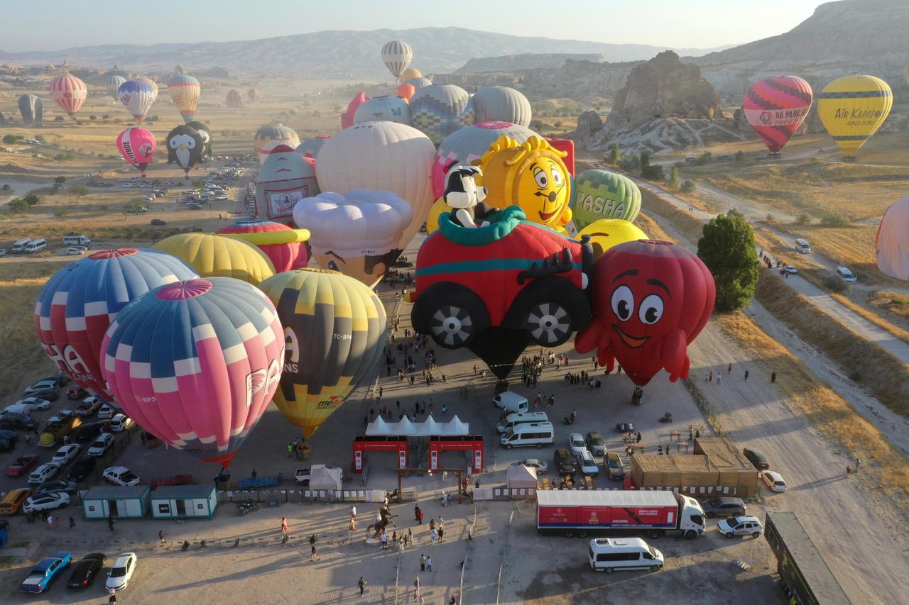 A view shows hot air balloons with various figures performing demonstration flight during the 8th stop of this year’s Türkiye Culture Route Festival organized by the Turkish Ministry of Culture and Tourism in Nevsehir, Türkiye, August 7, 2025. (AA Photo)