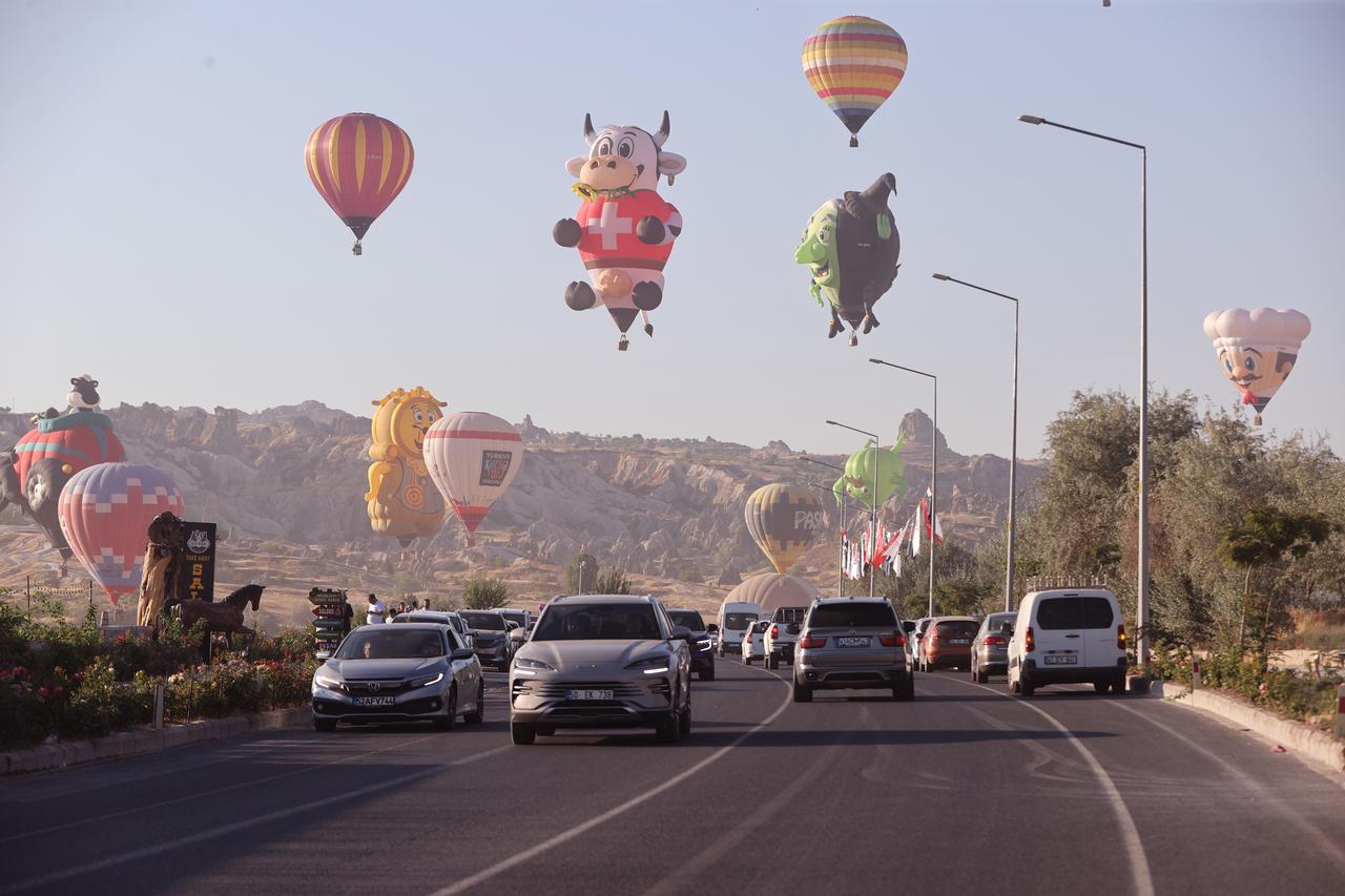 A view shows hot air balloons with various figures performing demonstration flight during the 8th stop of this year’s Türkiye Culture Route Festival organized by the Turkish Ministry of Culture and Tourism in Nevsehir, Türkiye, August 7, 2025. (AA Photo)