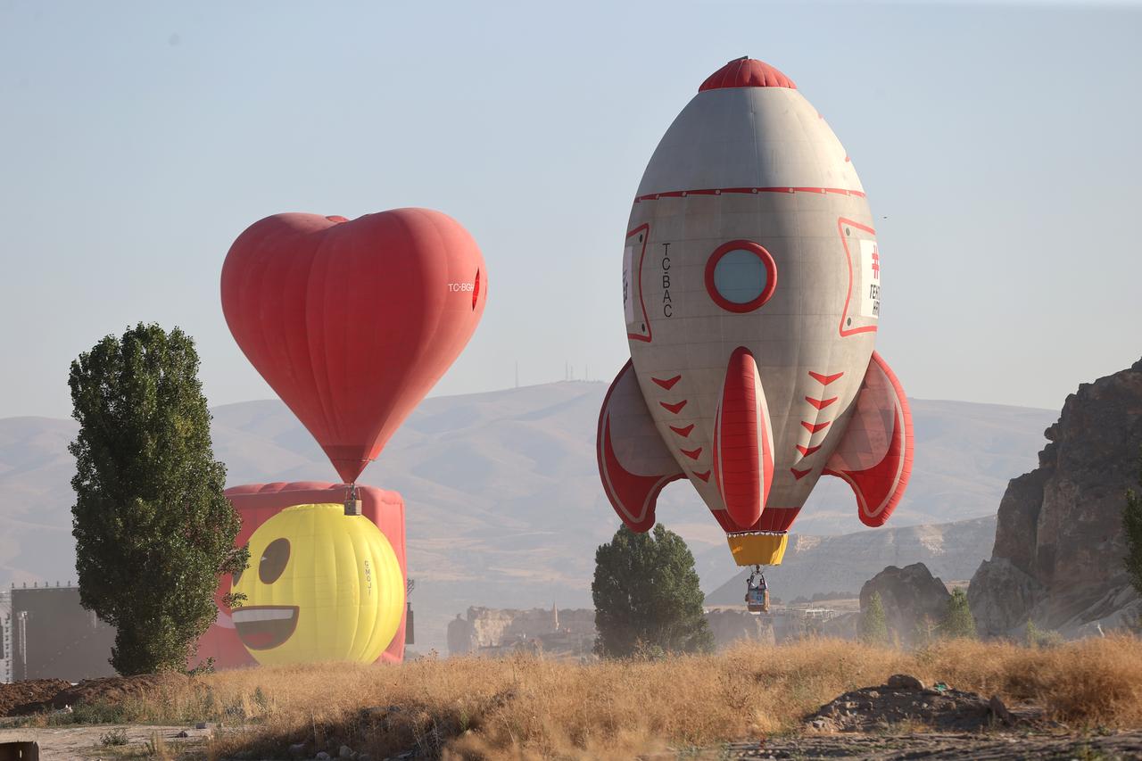 A view shows hot air balloons with various figures performing demonstration flight during the 8th stop of this year’s Türkiye Culture Route Festival organized by the Turkish Ministry of Culture and Tourism in Nevsehir, Türkiye, August 7, 2025. (AA Photo)