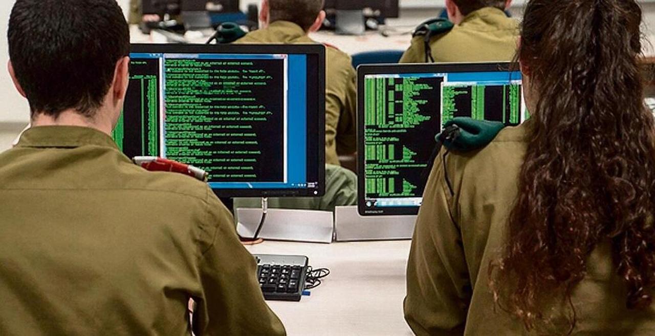 Israeli Unit 8200 soldiers  seen working on data somewhere in Israel on an unknown date. (Photo via Israeli Army)