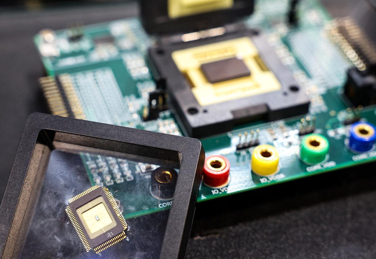 A sample of a semiconductor chip made by Taiwan Semiconductor Manufacturing Company (TSMC) is displayed at the Cybersec 2025 conference and expo in Taipei, Taiwan, April 15, 2025. (AFP Photo)