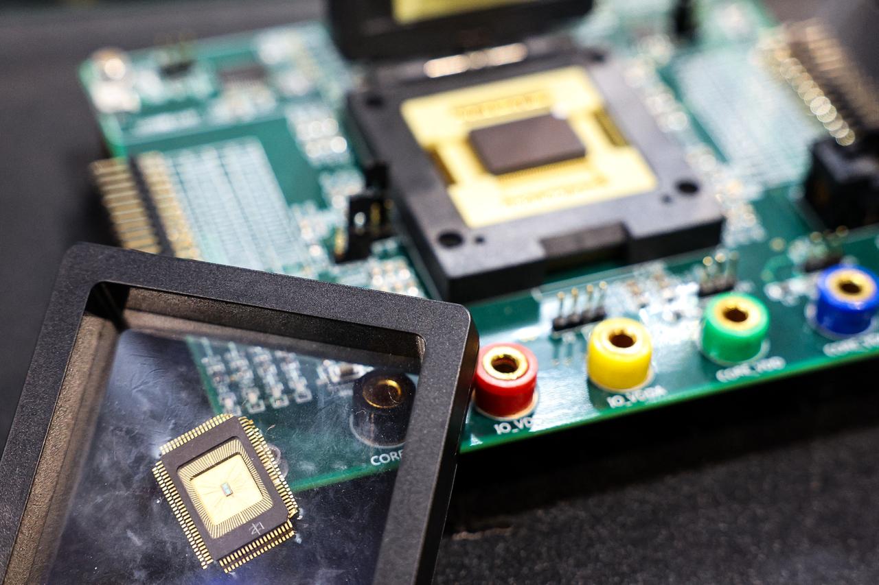 A sample of a semiconductor chip made by Taiwan Semiconductor Manufacturing Company (TSMC) is displayed at the Cybersec 2025 conference and expo in Taipei, Taiwan, April 15, 2025. (AFP Photo)