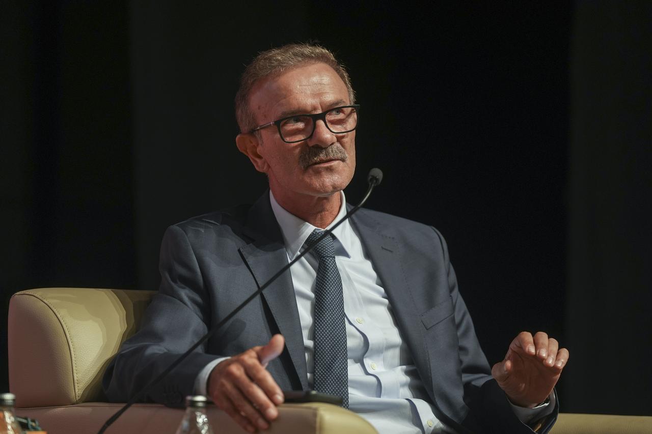 Professor Necmi Karul, Coordinator of the Tas Tepeler Project and Head of Excavations at Gobeklitepe and Karahantepe, delivers a presentation during the opening session of the “International Archaeology Symposium” organized by the Presidency and the Ministry of Culture and Tourism, Ankara, Türkiye, August 6, 2025. (AA Photo)