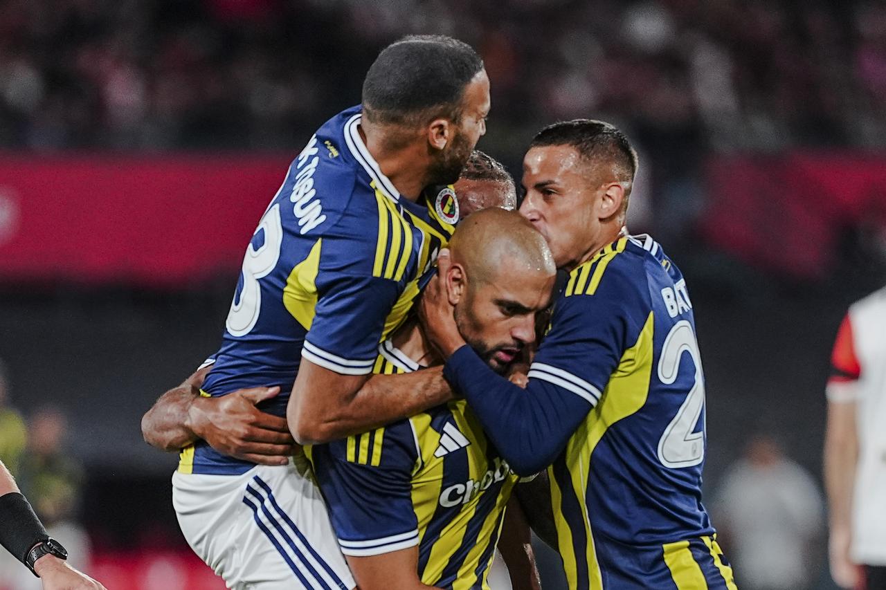 Players of Fenerbahce celebrate after scoring a goal during the UEFA Champions League third qualifying round first leg match between Fenerbahce and Feyenoord, in Rotterdam, the Netherlands on August 06, 2025. (AA Photo)