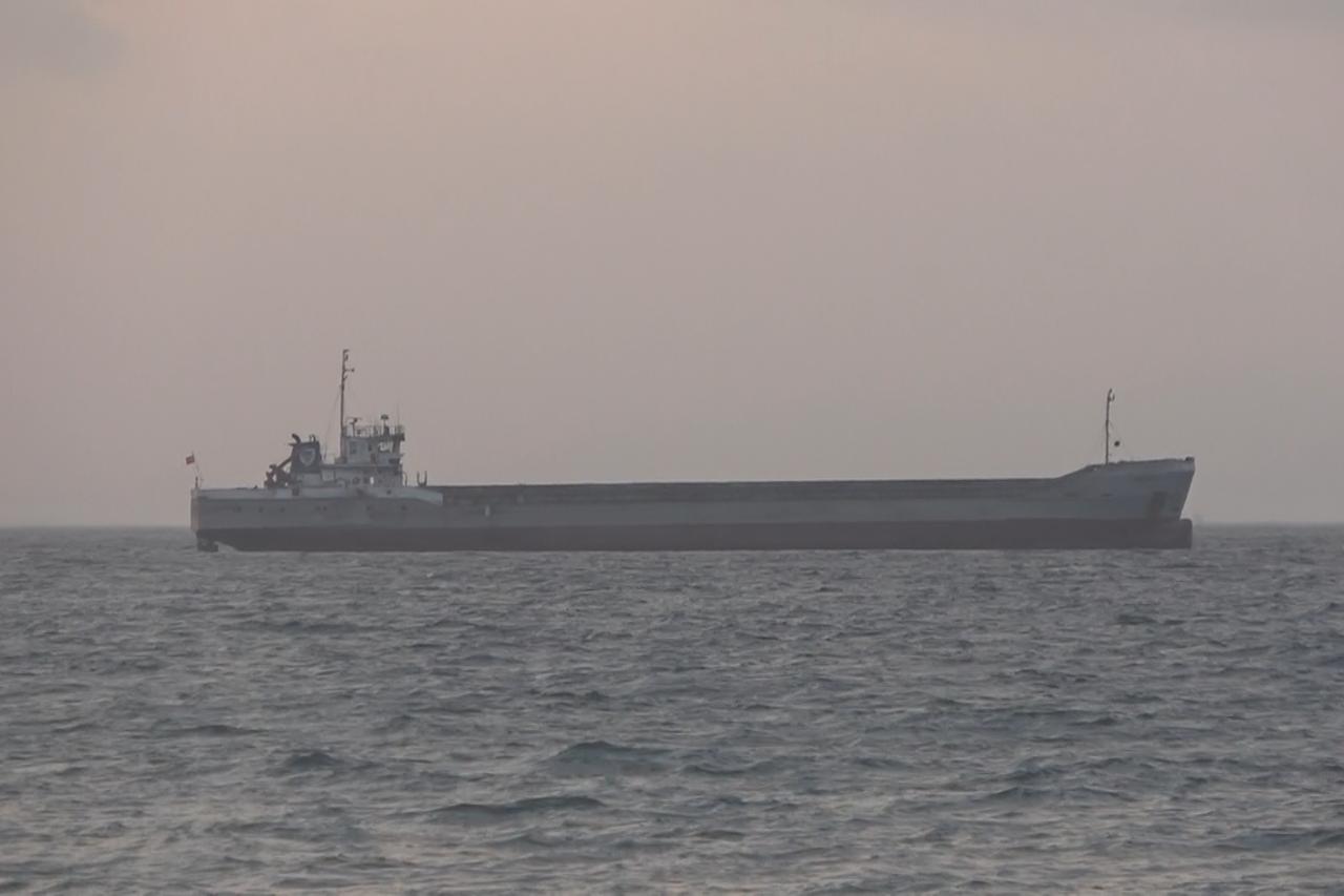 The cargo ship  Arel 7,  suspected of striking the shattered yacht of a missing businessman off the coast of Marmara Island in Balikesir, Türkiye, August 7, 2025. (IHA Photo)