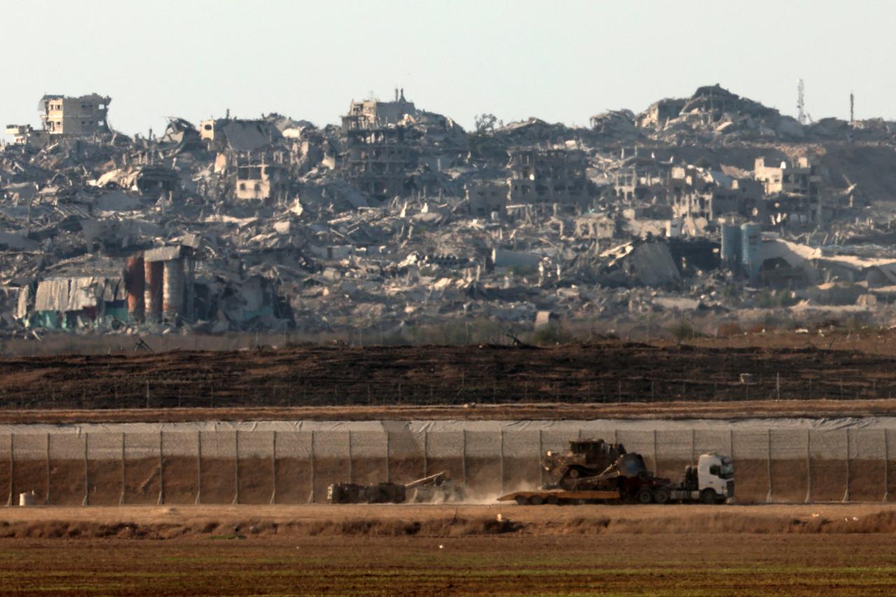 Israeli military vehicles near the separation fence and the destruction in the besieged Palestinian territory on August 7, 2025. (AFP Photo)