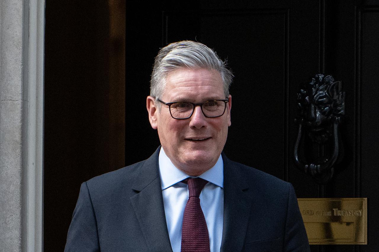Prime Minister Keir Starmer stands outside 10 Downing Street in London, United Kingdom on July 30, 2025. (AA Photo)