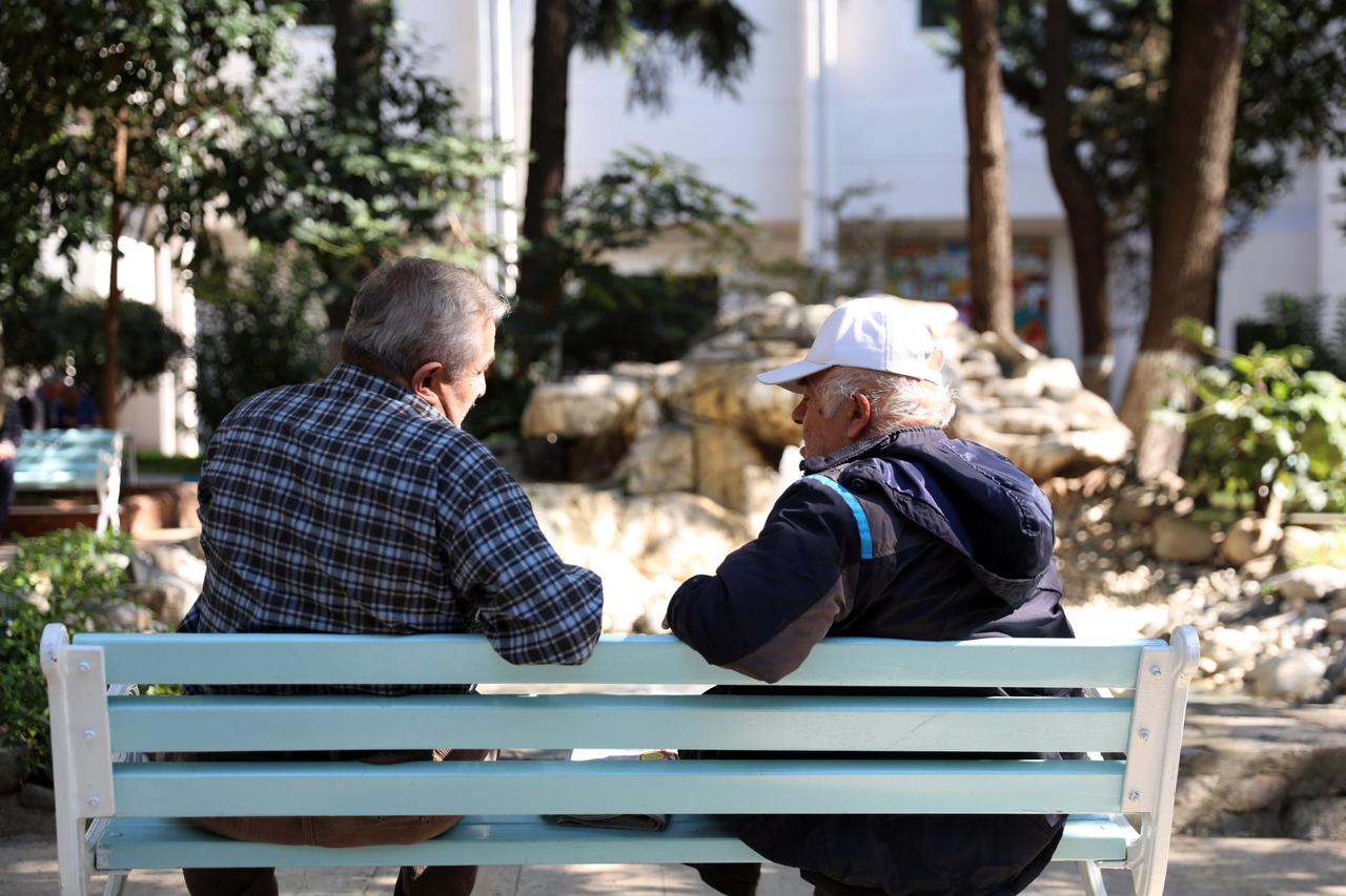 Two residents of a nursing home chat in Istanbul, Turkey, Oct. 1, 2020. (AA Photo)