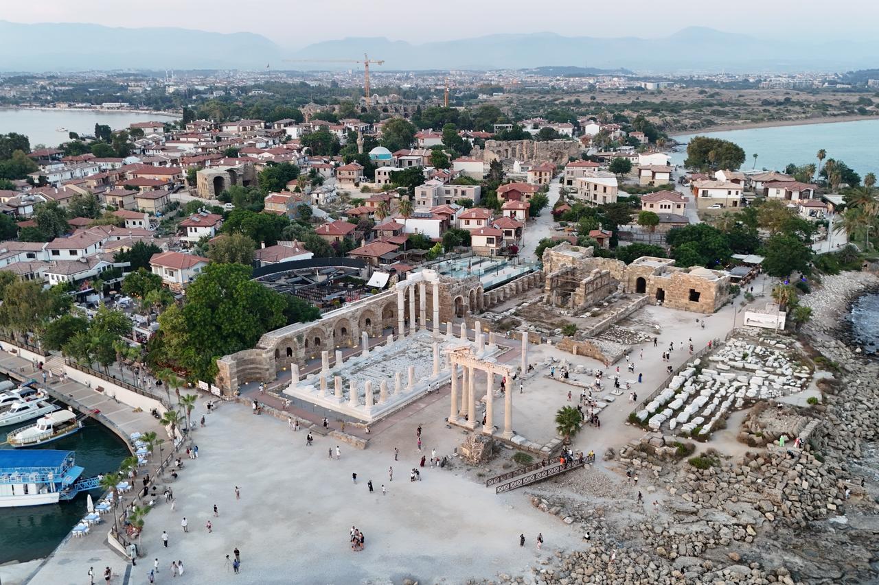 An aerial view of the ancient city of Side and the modern town in Antalya, Türkiye, August 7, 2025. (AA Photo)