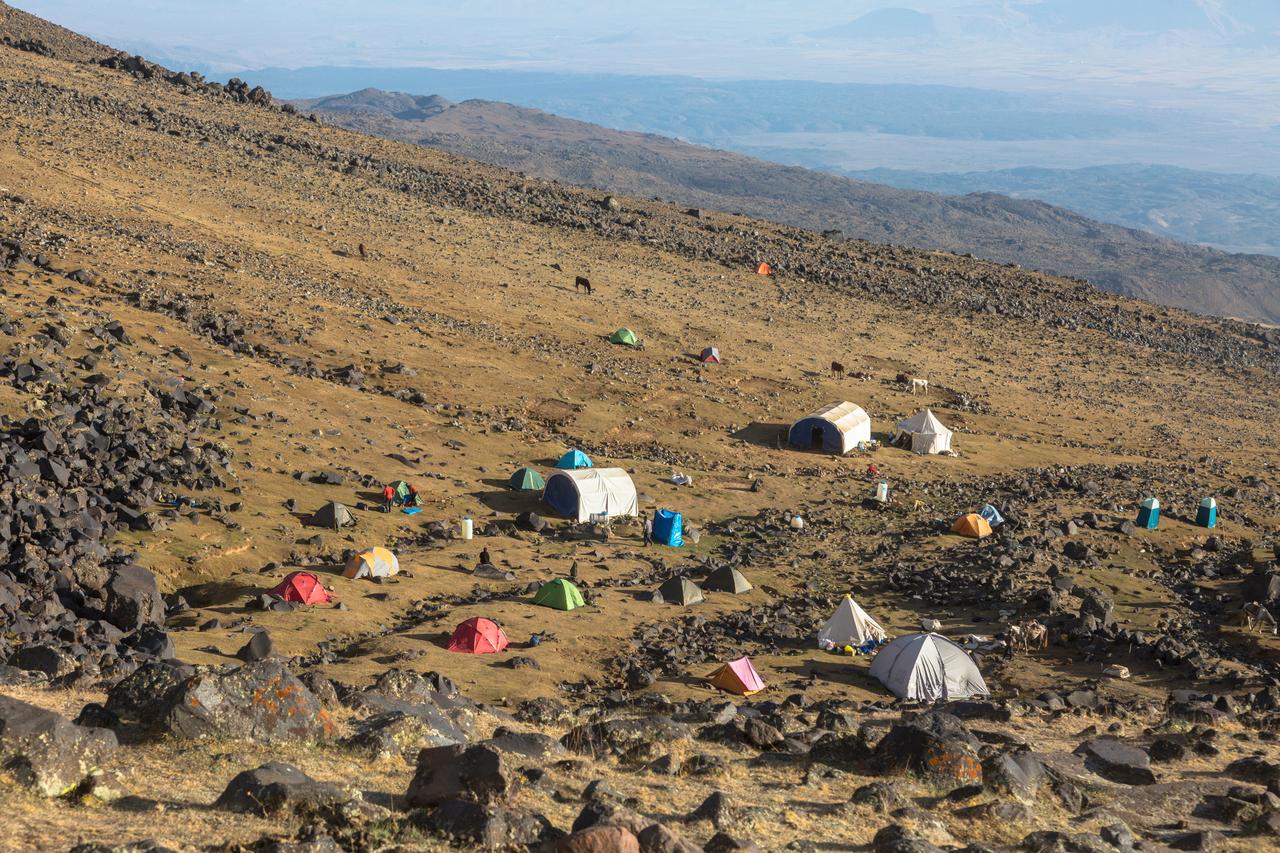 Aerial view of tent base camp for climbing the top of the extinct volcano Mount Greater Ararat, Agri, Türkiye, accessed August 9, 2025. (Adobe Stock Photo)