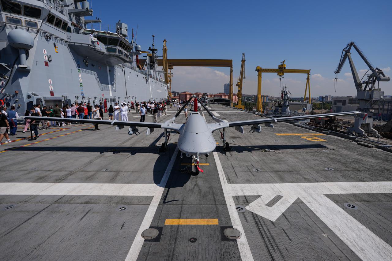 A Bayraktar TB3 UCAV as people visit the Teknofest Blue Homeland at Istanbul Shipyard Command in Istanbul, Türkiye, August 29, 2025. (AA Photo)