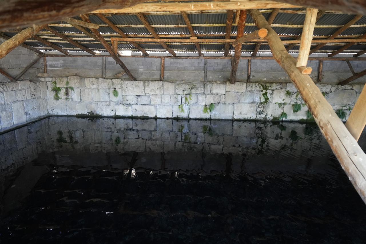Inside view of the Roman pool in Satala, with ancient stone walls surrounding the clear waters that have supplied Sadak village for centuries, Gumushane, Türkiye, Aug. 28, 2025. (IHA Photo)