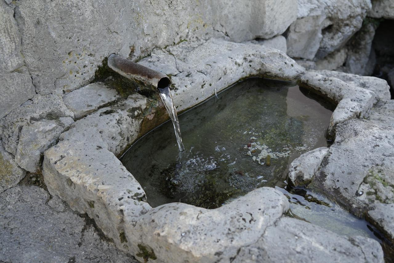 A detail view of the Roman pool in Satala ancient city, where fresh spring water has been flowing for nearly 2,000 years, in Sadak village, Gumushane, Türkiye, Aug. 28, 2025. (IHA Photo)