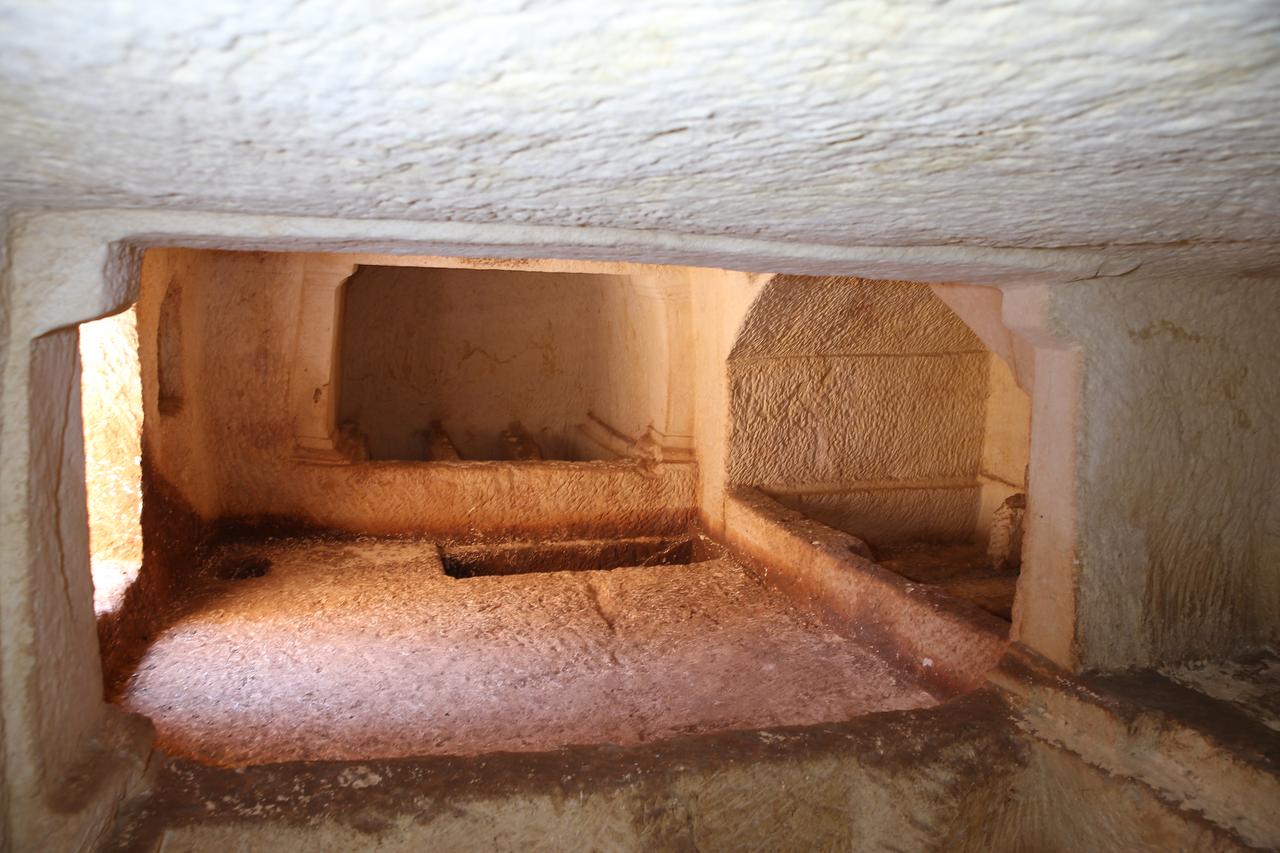 A view inside the rock-cut hypogeum tomb unearthed in the necropolis of Perre ancient city in Adiyaman, Türkiye, Sept. 1, 2025. (AA Photo)