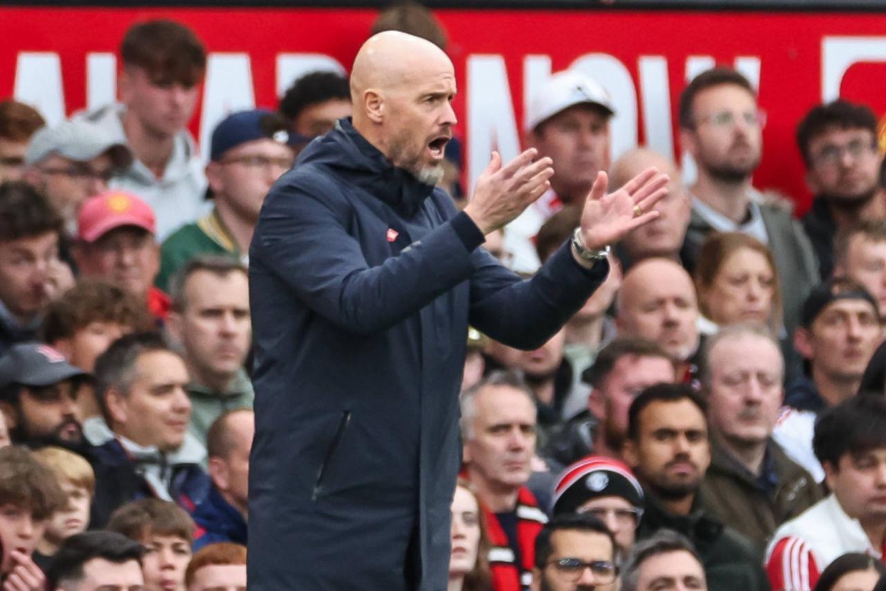 Erik ten Hag gestures from the touchline during a Manchester United match. (Photo via IMAGO)