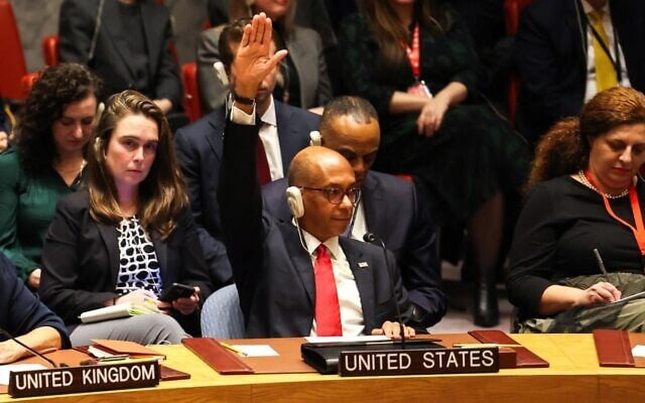 US Ambassador Alternate Representative of the US for Special Political Affairs in the United Nations Robert A. Wood raises his hand during a United Nations Security Council meeting on Gaza, at UN headquarters in New York City, December 8, 2023. (AFP Photo)