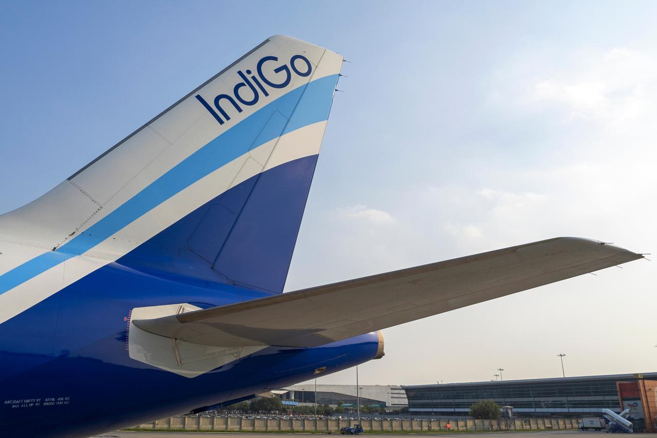 IndiGo livery on the tail of an Airbus A321neo aircraft at Indira Gandhi International Airport, India., September 29, 2022. (Adobe Stock Photo)