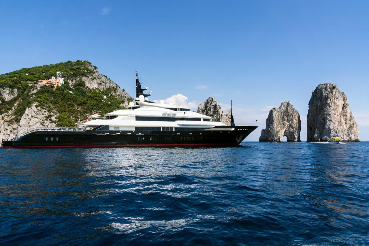 The superyacht Alfa Nero cruising off the coast. (Adobe Stock Photo)