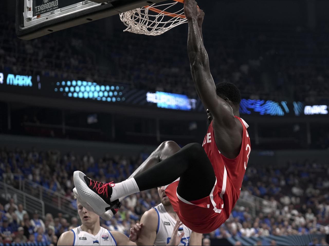 Adem Bona of Türkiye scores a basket during the FIBA EuroBasket 2025 Group A basketball match between Türkiye and Estonia in Riga, Latvia, September 01, 2025. (AA Photo)