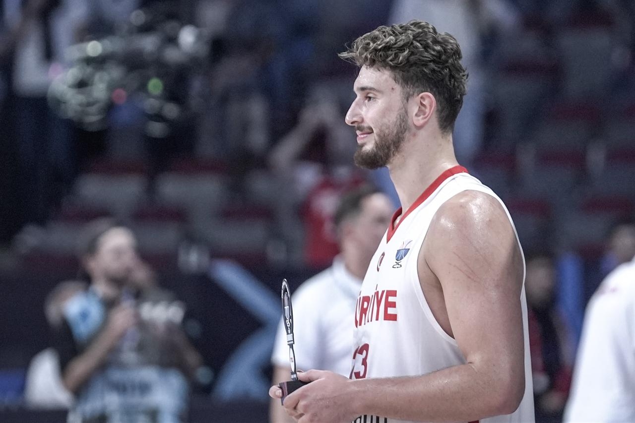 Alperen Sengun (23) of Türkiye celebrates victory at the end of the FIBA EuroBasket 2025 quarterfinal match between Türkiye and Poland at Arena Riga in Riga, Latvia, September 9, 2025. (AA Photo)