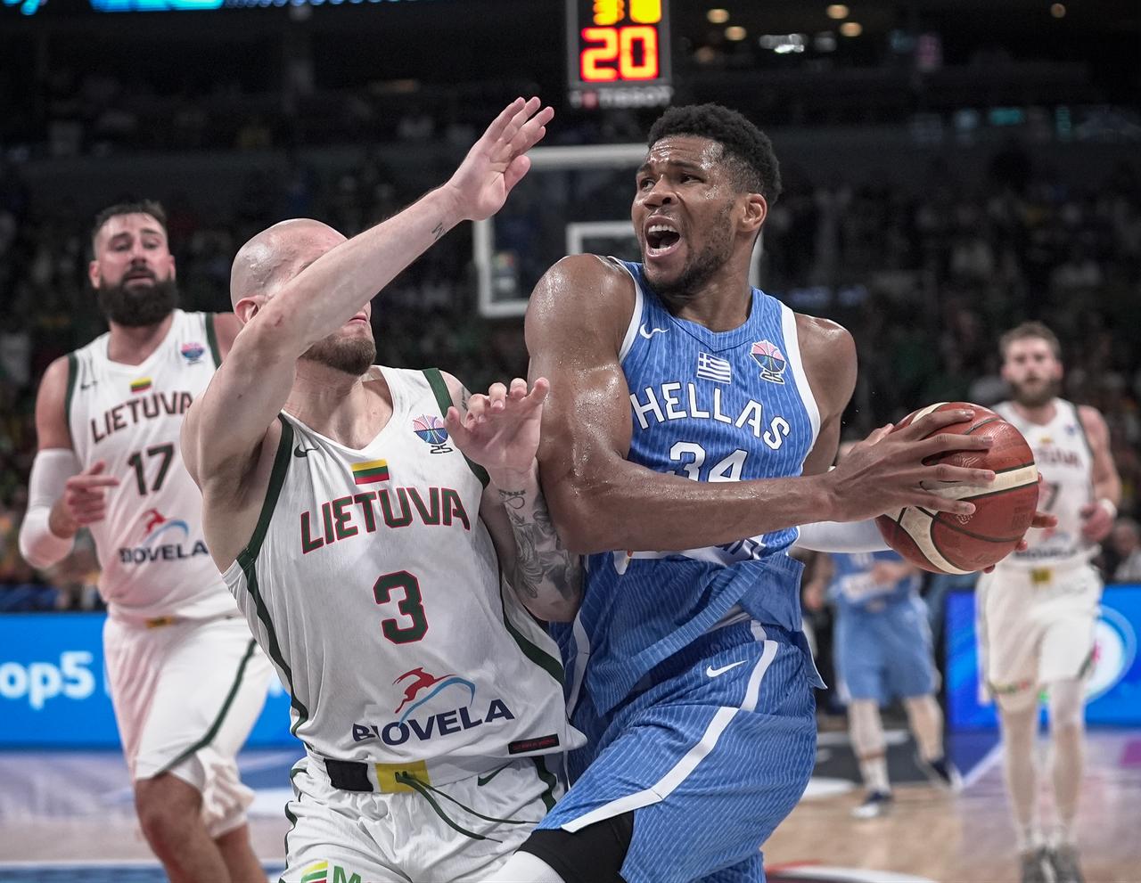 Arnas Velicka (3) of Lithuania in action against Giannis Antetokounmpo (R) of Greece during the FIBA EuroBasket 2025 quarterfinal match between Lithuania and Greece at Arena Riga in Riga, Latvia, September 9, 2025. (AA Photo)