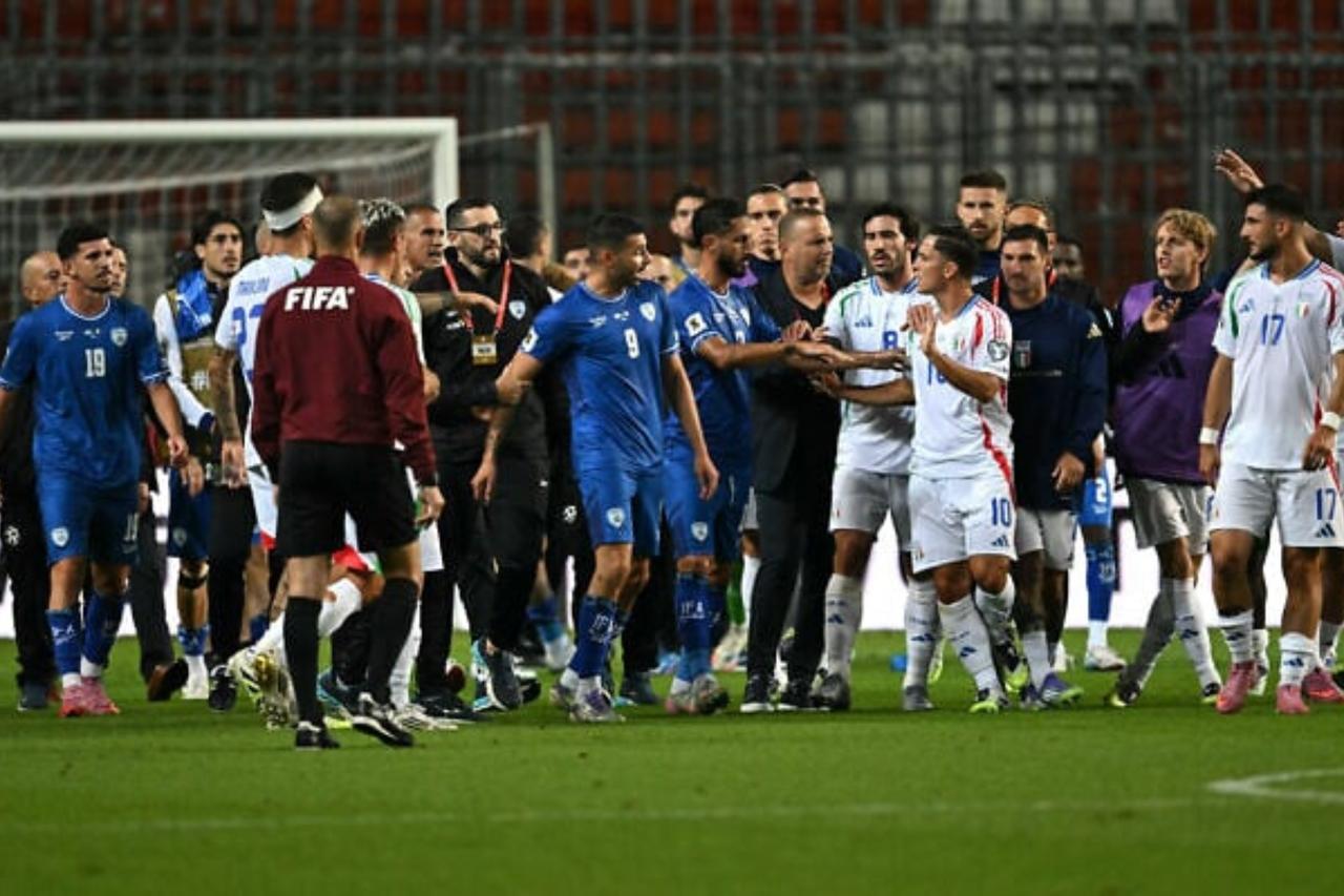 Italy’s and Israel’s players argue after the end of the 2026 World Cup qualifiers Europe zone Group I soccer match in Debrecen, Hungary on Sep. 8, 2025. (AFP Photo)