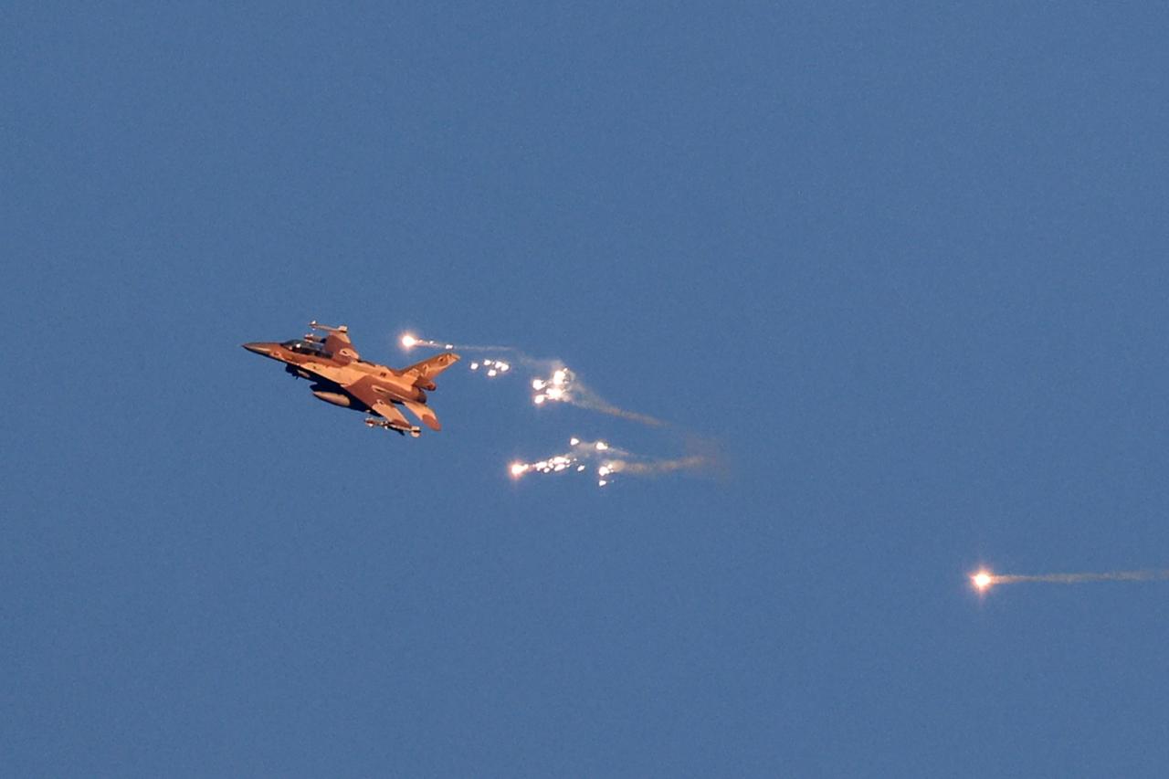 This photo, taken from a position in northern Israel, shows an Israeli Air Force fighter jet firing flares, August 25, 2024. (AFP Photo)