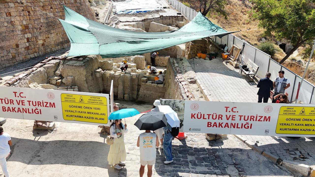 Visitors observe the 5th-century necropolis excavation site that may be opened as an archaeopark near Goreme, Nevsehir, Türkiye, September 11, 2025. (IHA Photo)