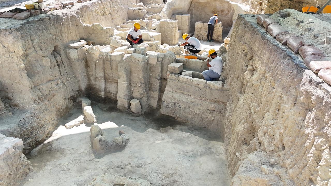 Archaeologists document carved sections inside the necropolis unearthed near Goreme, Nevsehir, Türkiye, September 11, 2025. (IHA Photo)
