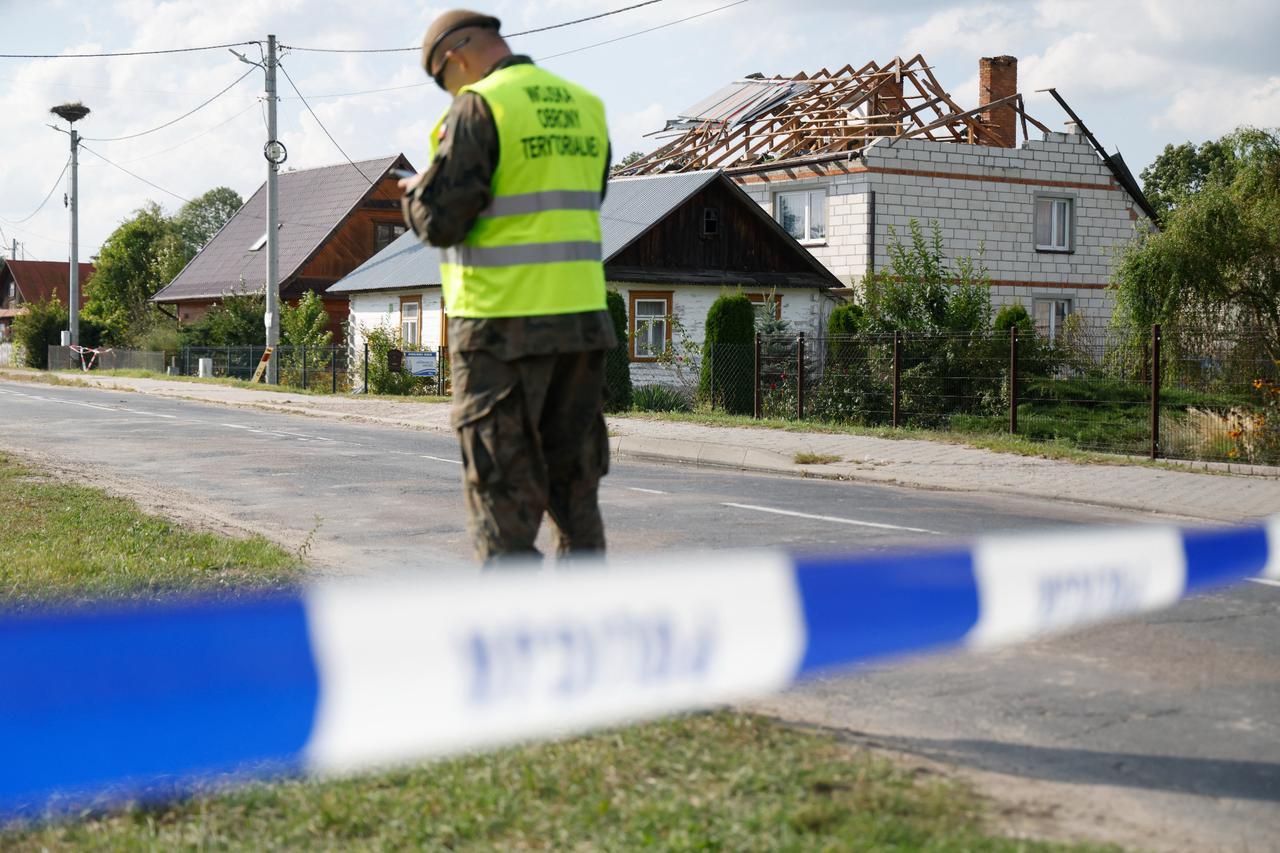 Police and army inspect damage to a house destroyed by debris from a shot down Russian drone in the village of Wyryki-Wola, eastern Poland, on September 10, 2025. (AFP Photo)